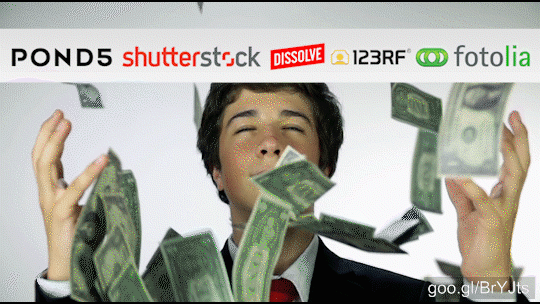 Stock footage of Money Falling On Young Business Man