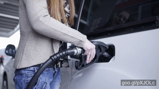 Stock footage of Woman Removing Handle From Car Hole 4K