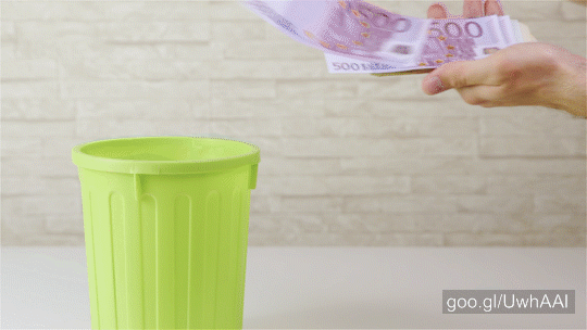 Stock Footage of Throwing Money Away In Trash Can 4K